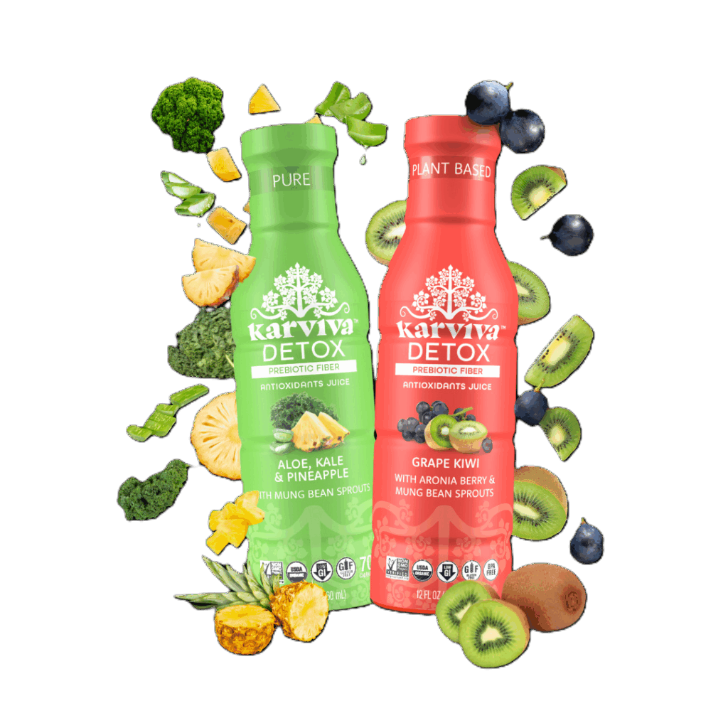 Two bottles of Karviva Detox in two flavours surrounded by fruits and berries.