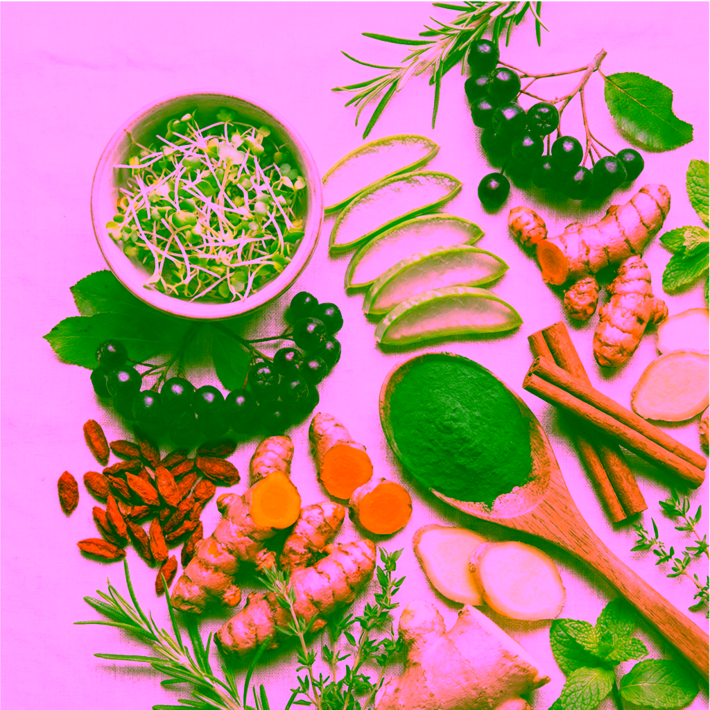 Assorted fresh herbs and superfoods on table