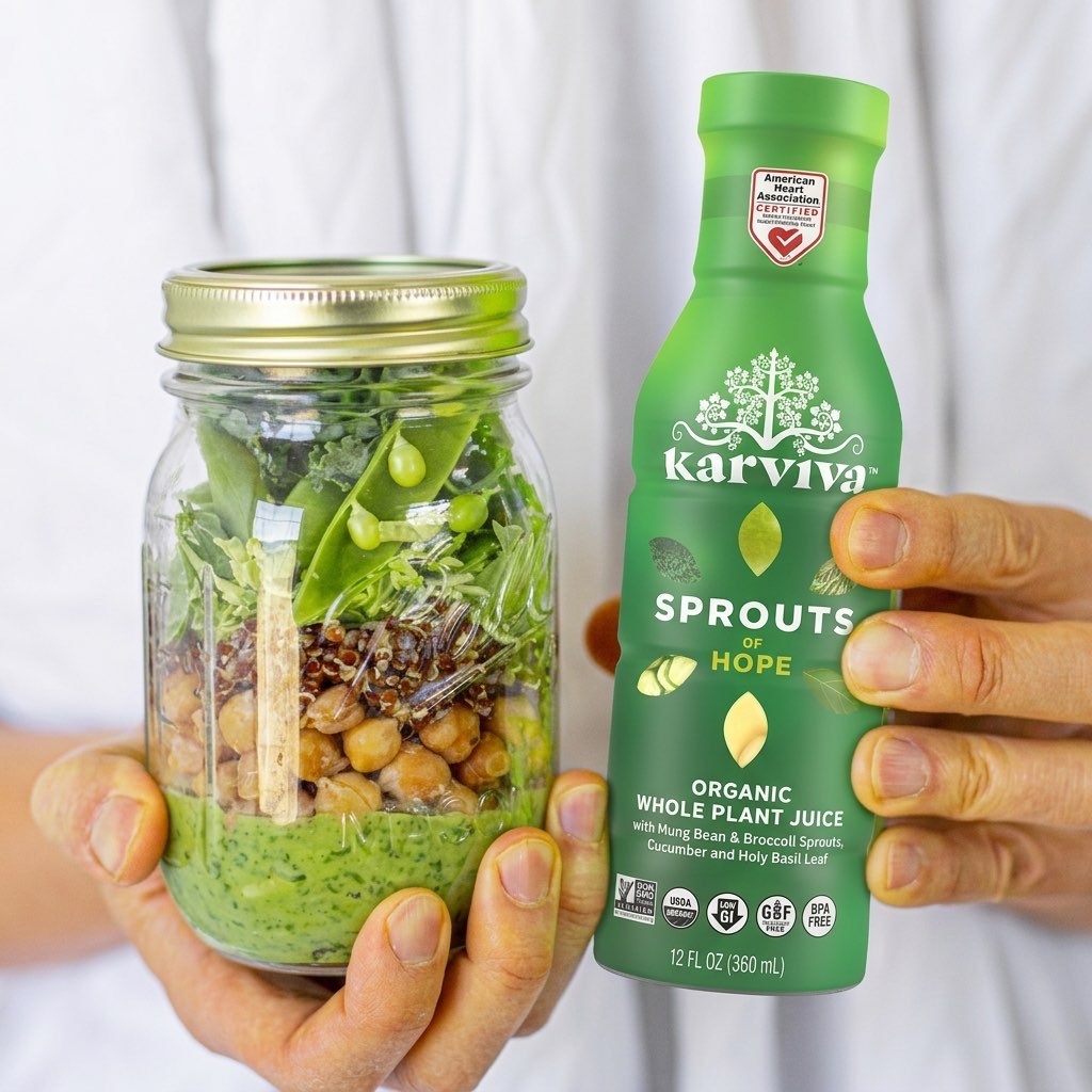 Mason jar salad and green organic juice bottle